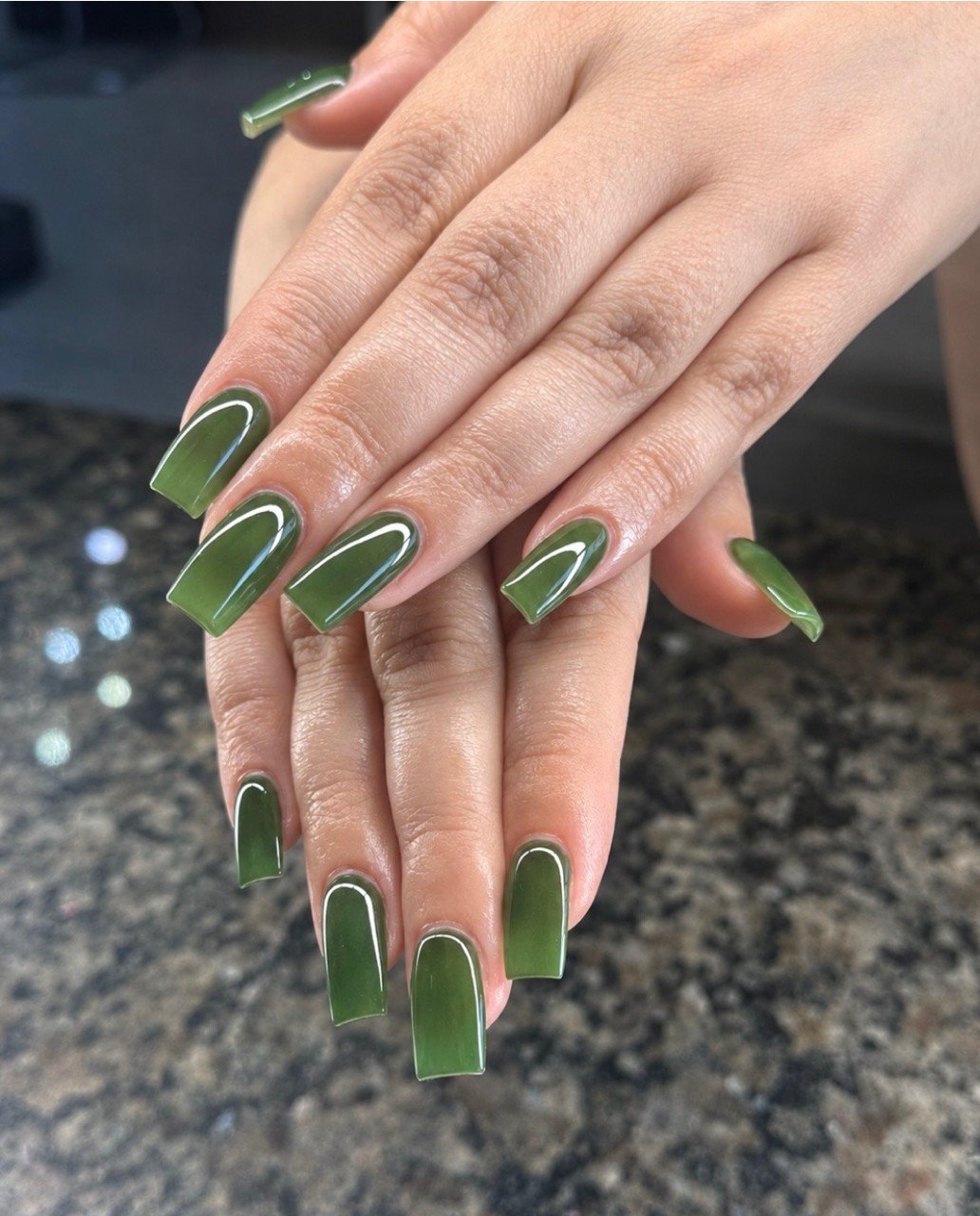 Green nail design at La Bella Nail and Spa