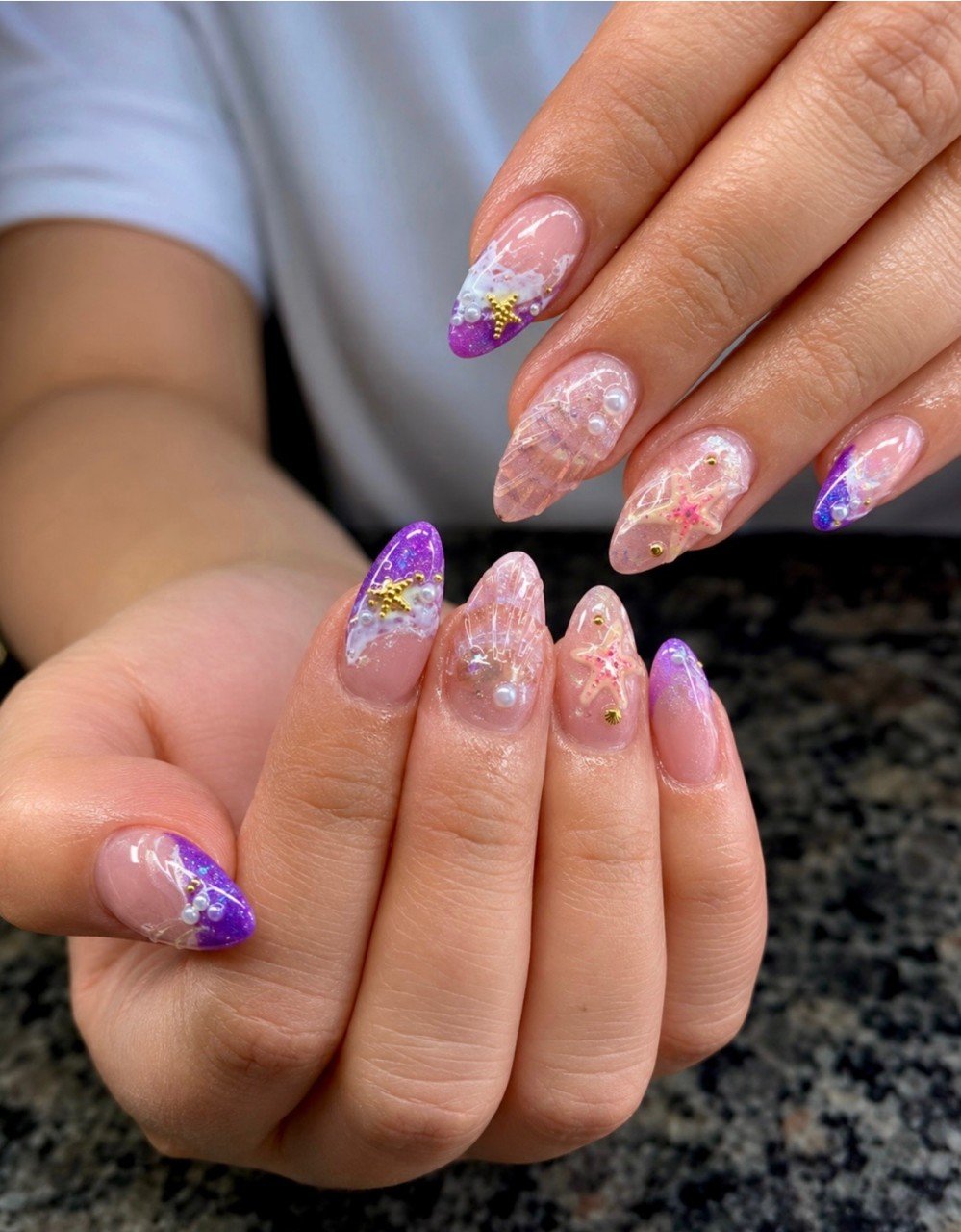 Purple nail design at La Bella Nail and Spa